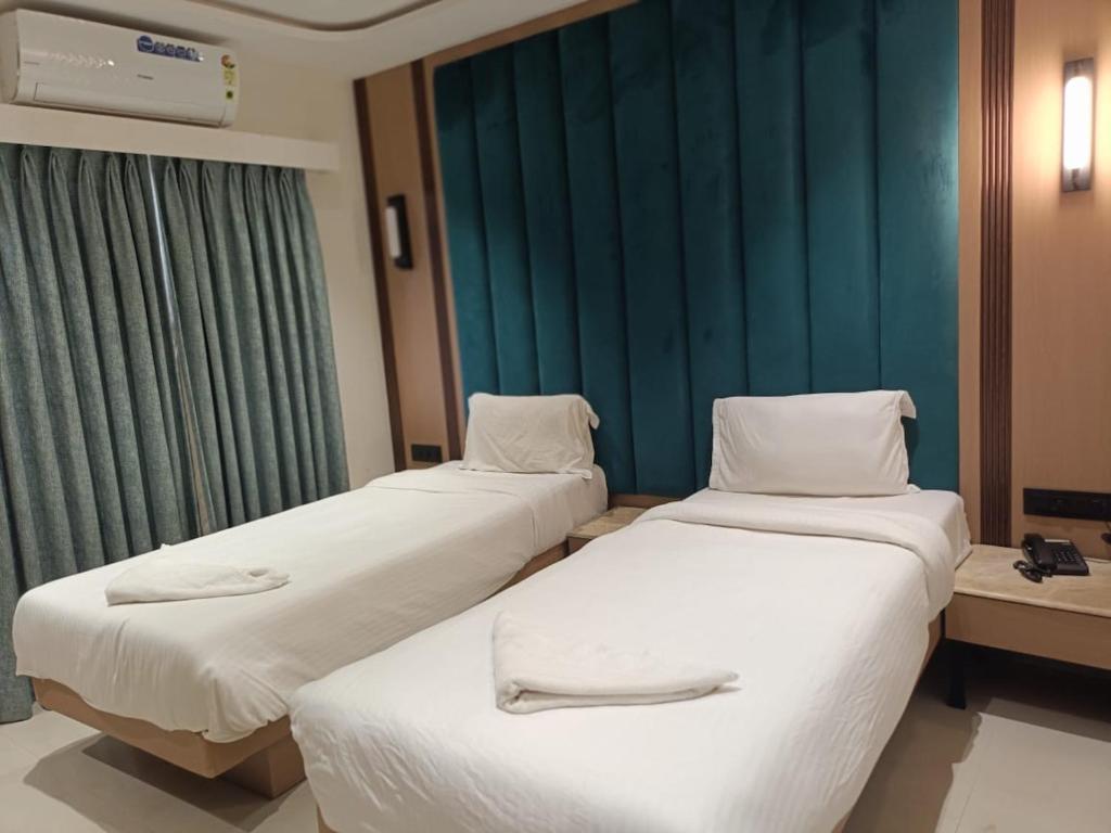 Postel nebo postele na pokoji v ubytování HOTEL SUPREME (VASCO)