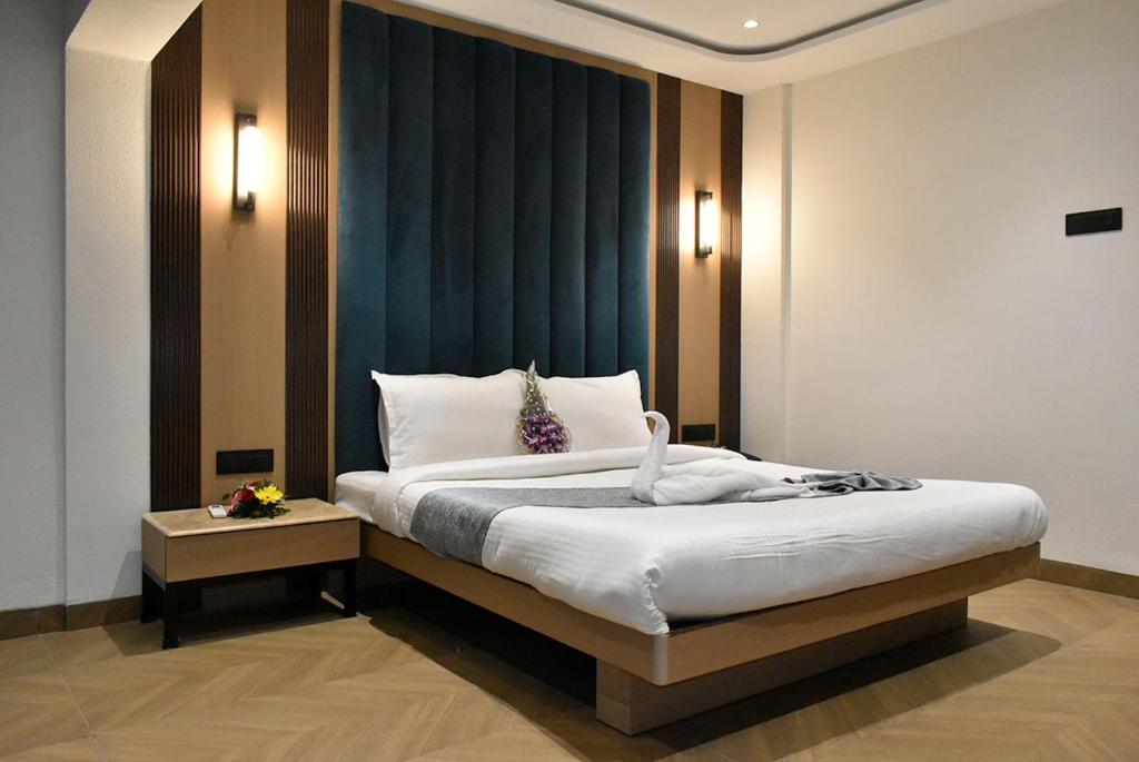 Postel nebo postele na pokoji v ubytování HOTEL SUPREME (VASCO)
