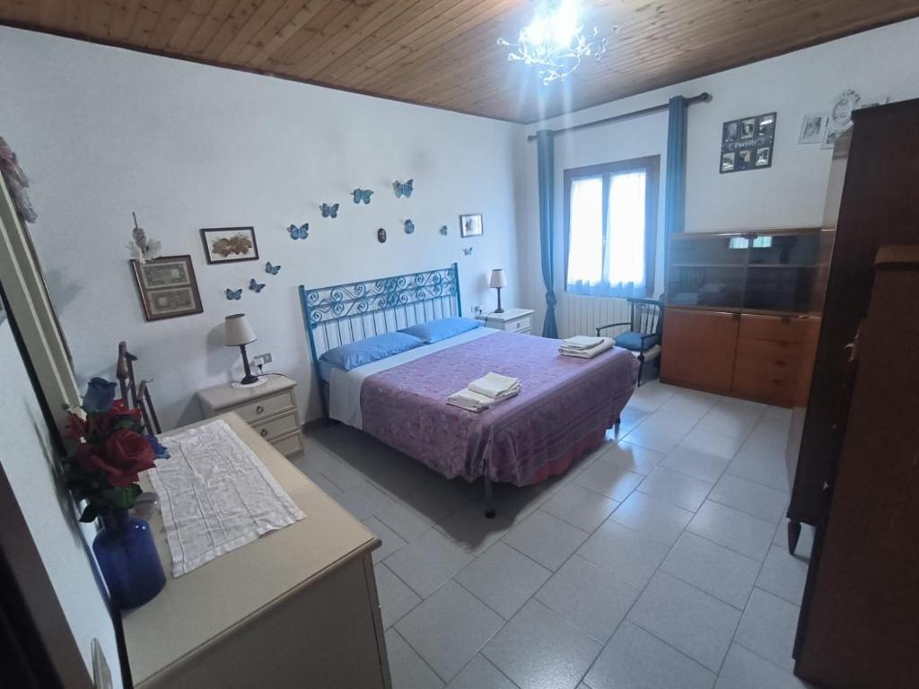 Ένα ή περισσότερα κρεβάτια σε δωμάτιο στο Villa Very II