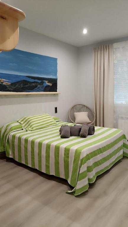 Posteľ alebo postele v izbe v ubytovaní Apartamentos Monte do Limo