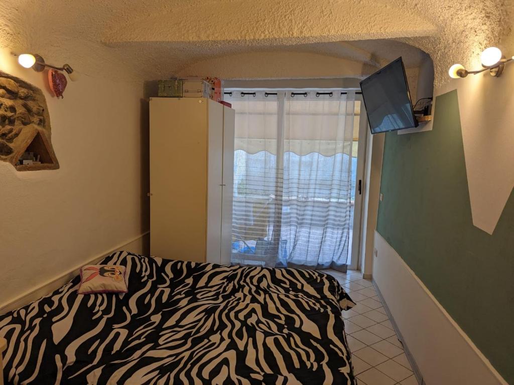 APPARTAMENTO CHECK iN客房内的一张或多张床位