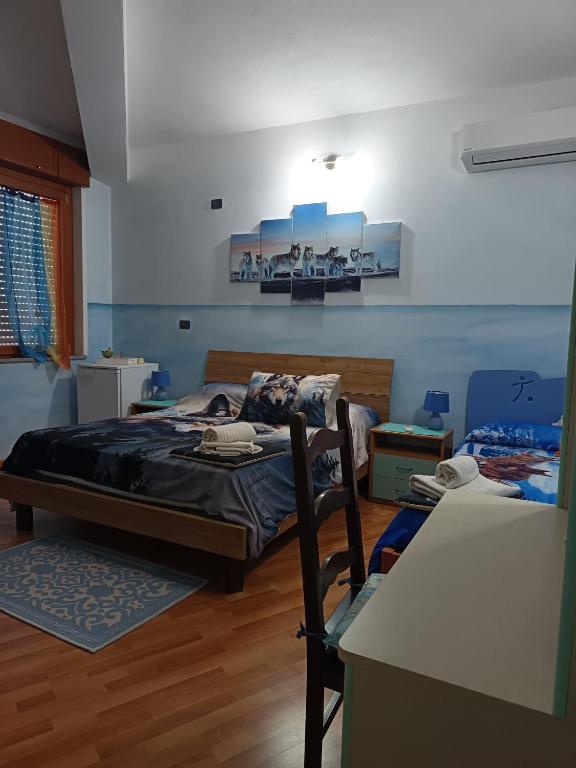 Postel nebo postele na pokoji v ubytování B&B Il Rifugio del Lupo - E6721
