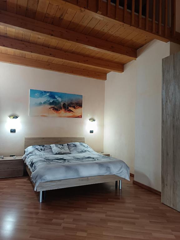 Postel nebo postele na pokoji v ubytování B&B Il Rifugio del Lupo - E6721