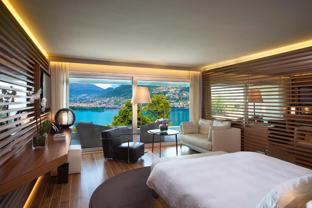 Postel nebo postele na pokoji v ubytování The View Lugano