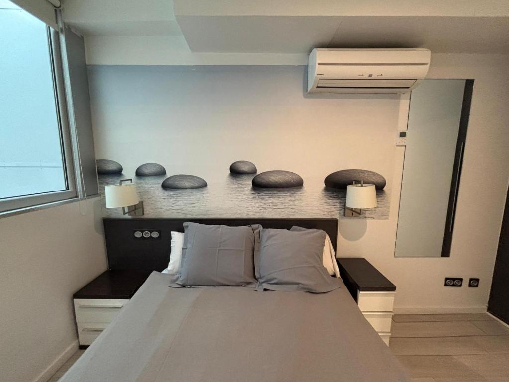 Postel nebo postele na pokoji v ubytování Hotel Punta Monpas