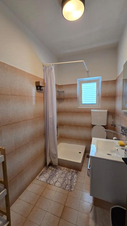 Kúpeľňa v ubytovaní Apartman Juraga