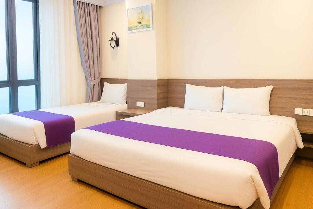 Postel nebo postele na pokoji v ubytování Yen Indochine