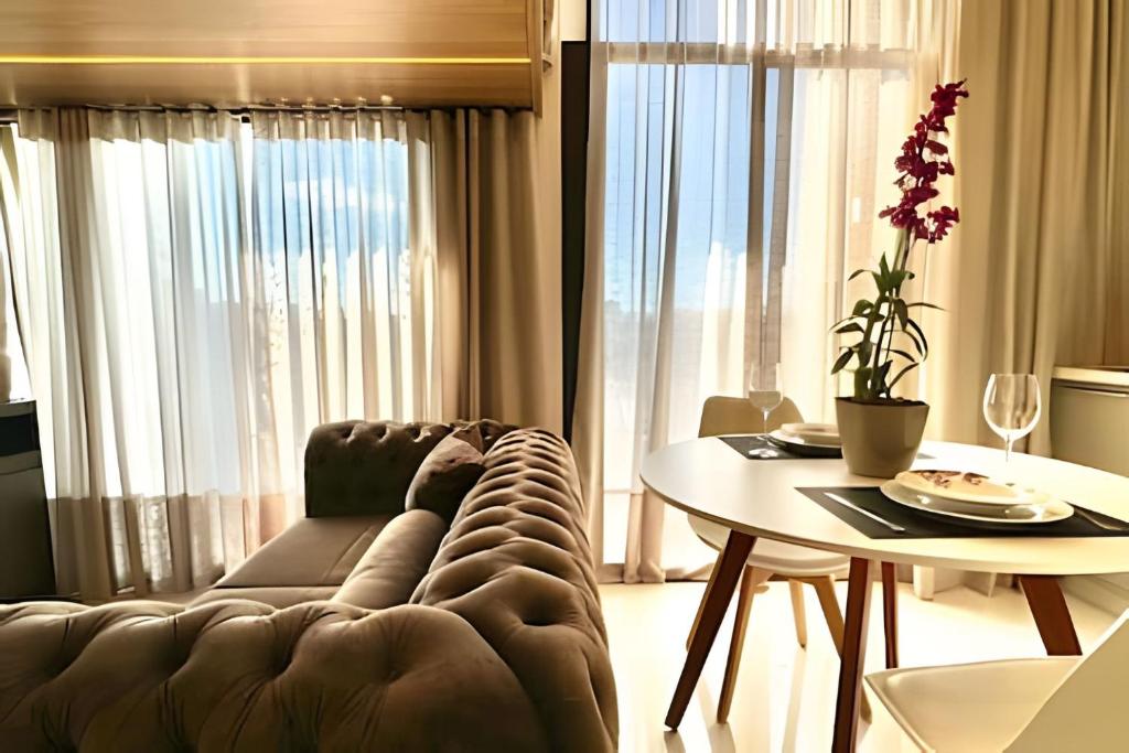 Posezení v ubytování Luxuoso Loft com Garagem, Ar cond. Jacuzzi e Wifi