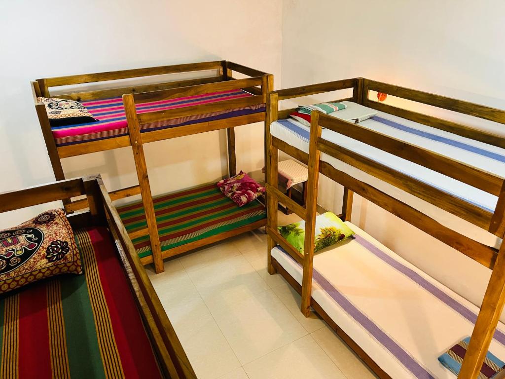 Postel nebo postele na pokoji v ubytování Horizon Resort & Hostel Sigiriya