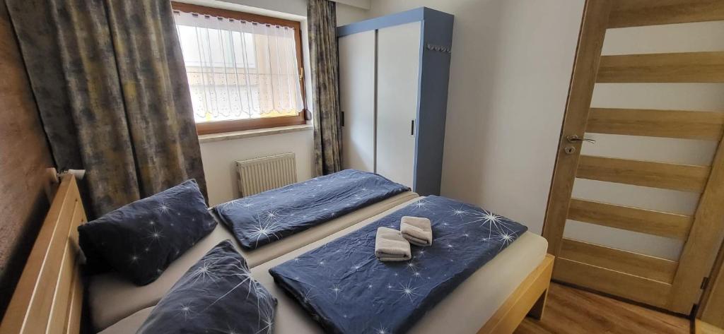 Postel nebo postele na pokoji v ubytování Apartmán Pavel