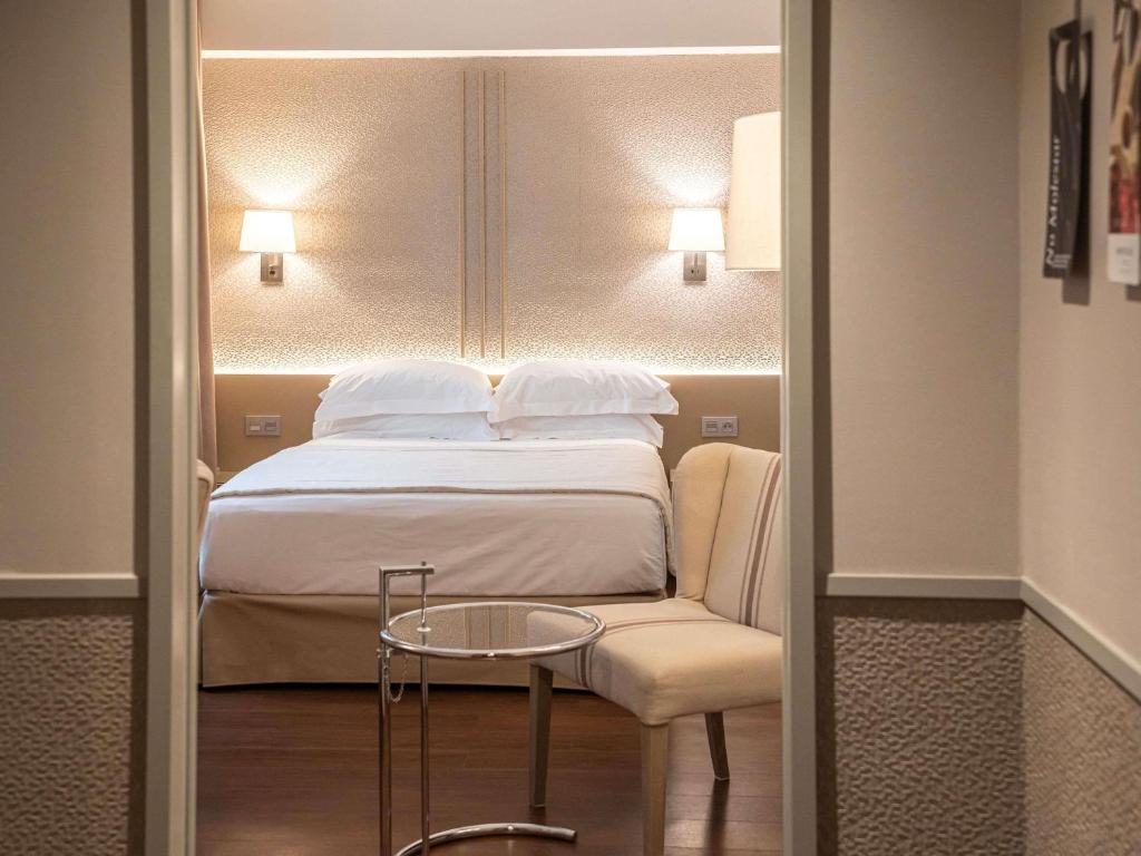 Postel nebo postele na pokoji v ubytování Mercure Monte Igueldo