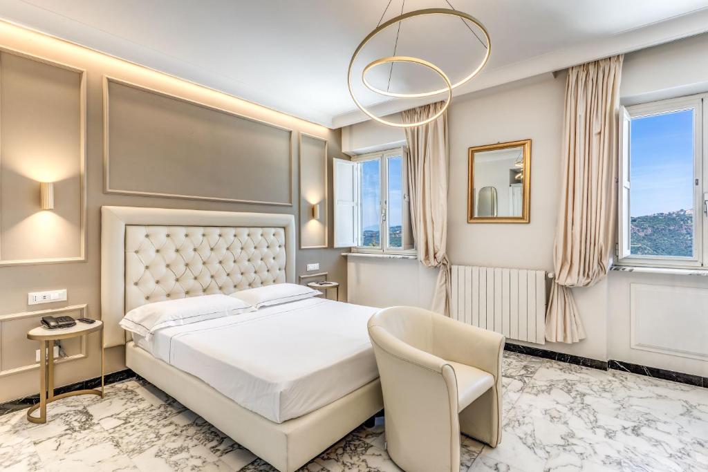 Łóżko lub łóżka w pokoju w obiekcie Hotel Castel Vecchio