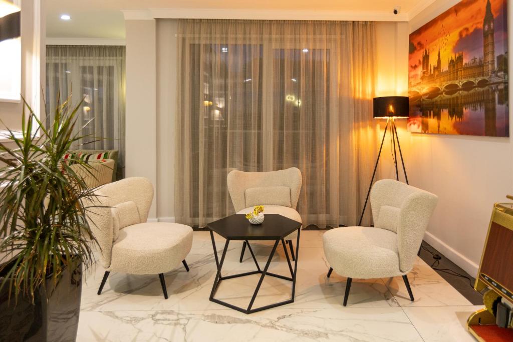 Posezení v ubytování Hotel Britania