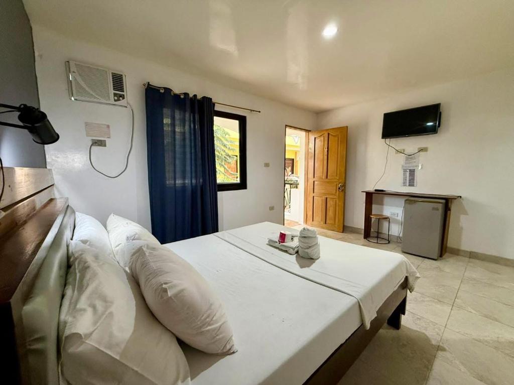 Postel nebo postele na pokoji v ubytování Marion Roos Hotel