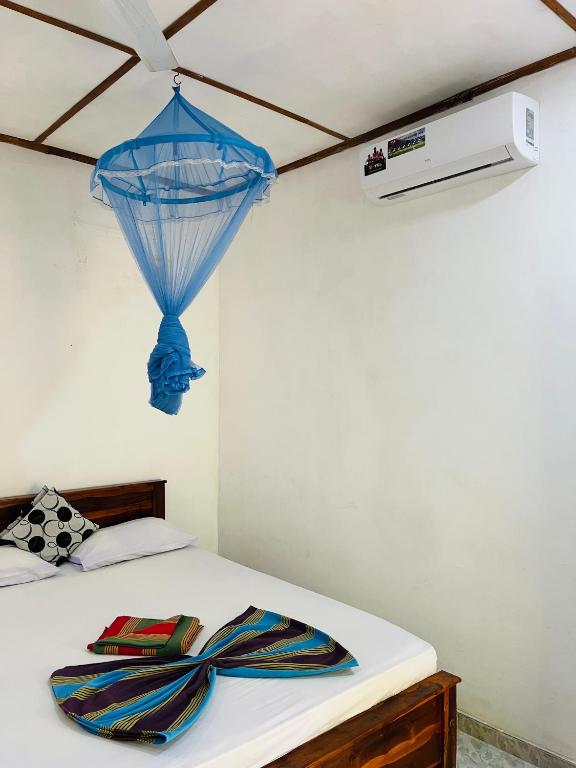 Postel nebo postele na pokoji v ubytování Horizon Resort & Hostel Sigiriya