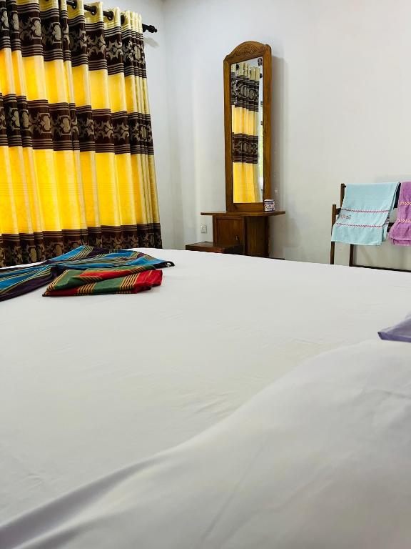 Postel nebo postele na pokoji v ubytování Horizon Resort & Hostel Sigiriya