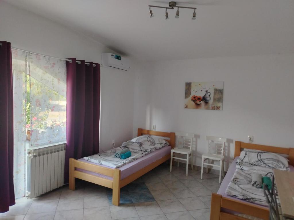 Postel nebo postele na pokoji v ubytování Apartment Ada bed & breakfast