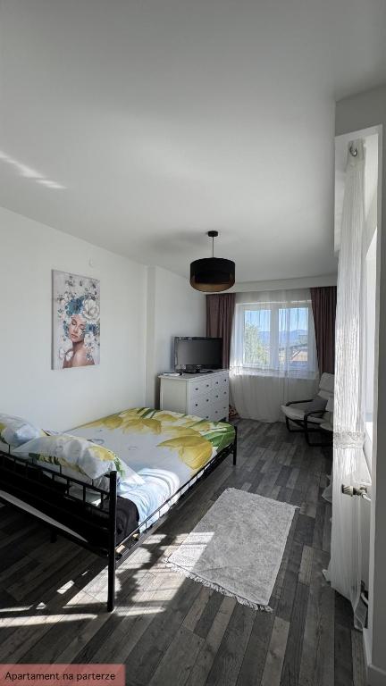 Posteľ alebo postele v izbe v ubytovaní Apartament Słoneczna Dolina Magurki bania jacuzzi balia ogrodowa Szczyrk-Wilkowice