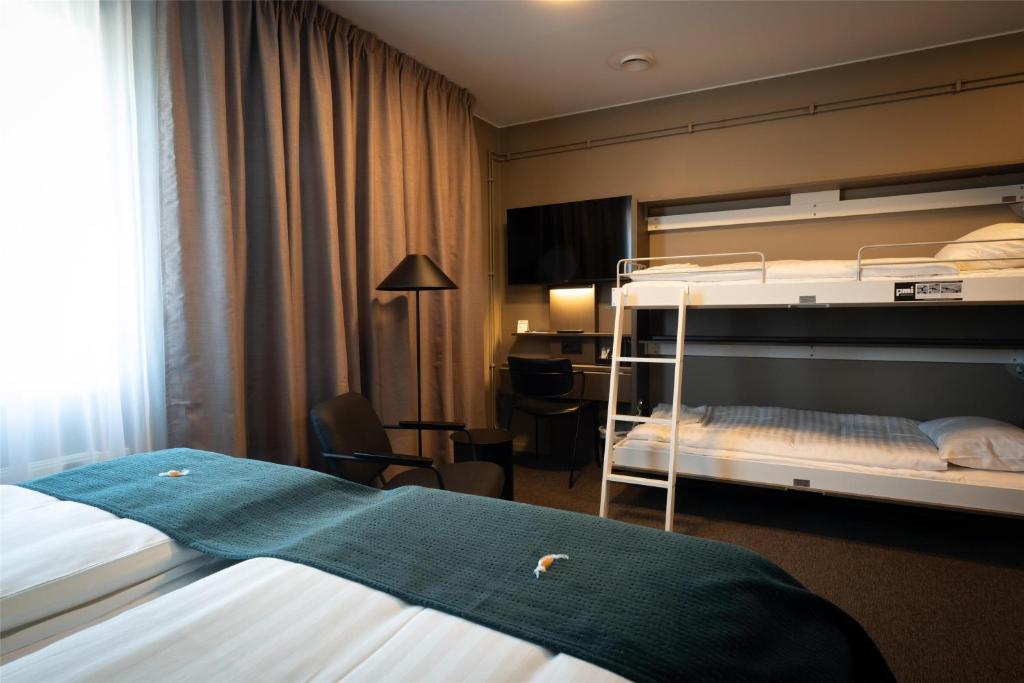 Postel nebo postele na pokoji v ubytování Best Western Hotel Vidöstern