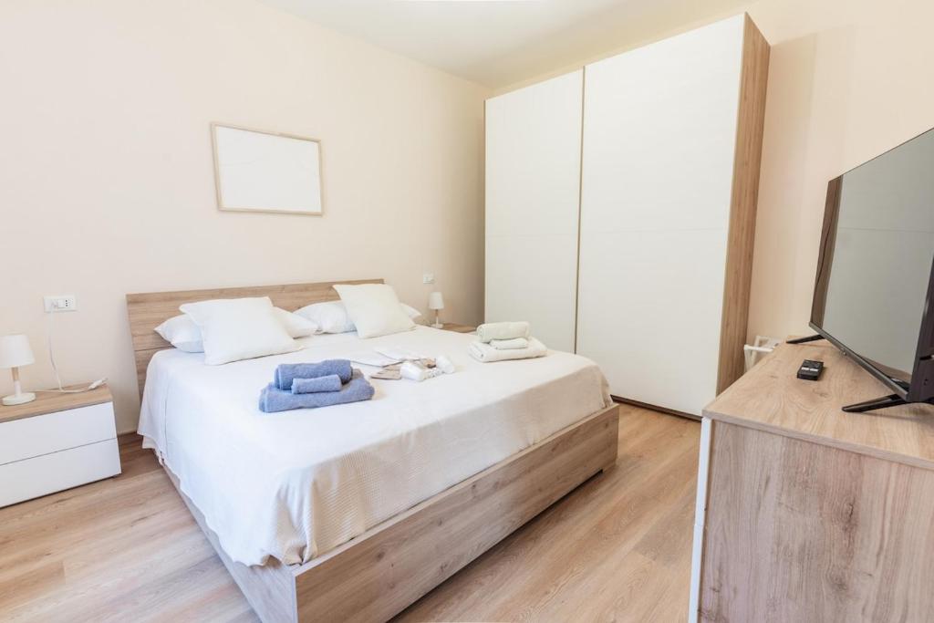 Ένα ή περισσότερα κρεβάτια σε δωμάτιο στο The small lemon garden