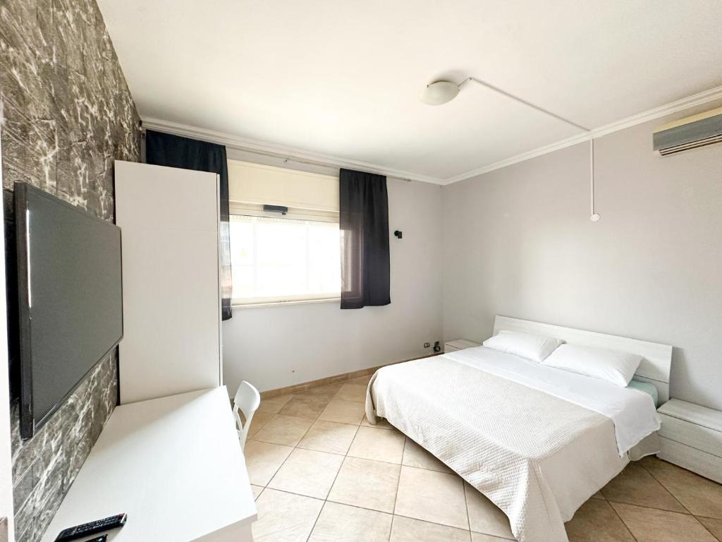 Postel nebo postele na pokoji v ubytování Specter Guesthouse