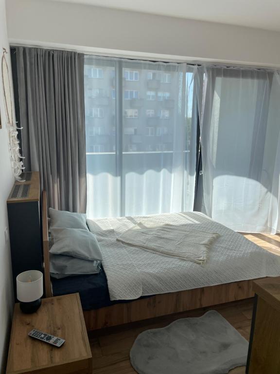 Postel nebo postele na pokoji v ubytování Na Hanzie