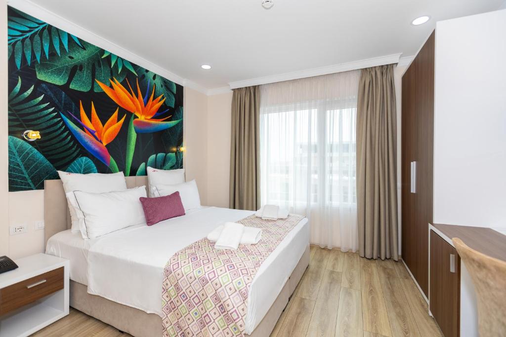 Postel nebo postele na pokoji v ubytování Hotel Britania