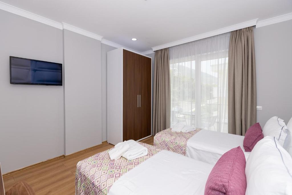Postel nebo postele na pokoji v ubytování Hotel Britania