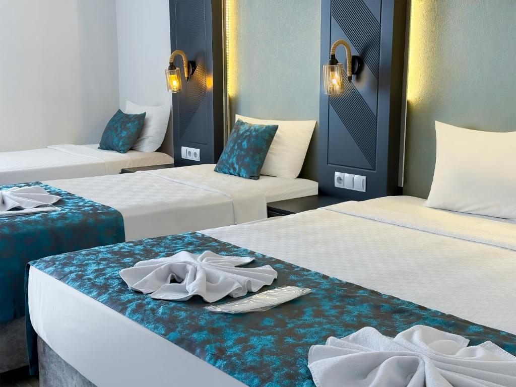 Postel nebo postele na pokoji v ubytování ANYA RESORT HOTEL