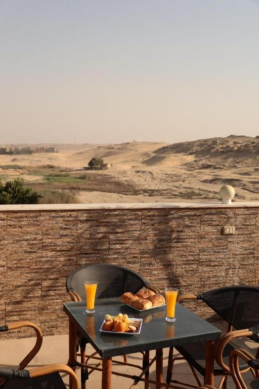 Balkón nebo terasa v ubytování Royal Scarab Pyramids Hotel