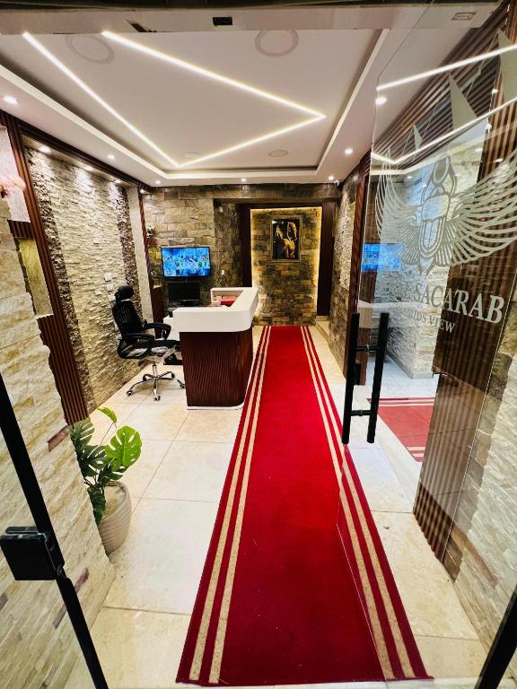 TV a/nebo společenská místnost v ubytování Royal Scarab Pyramids Hotel