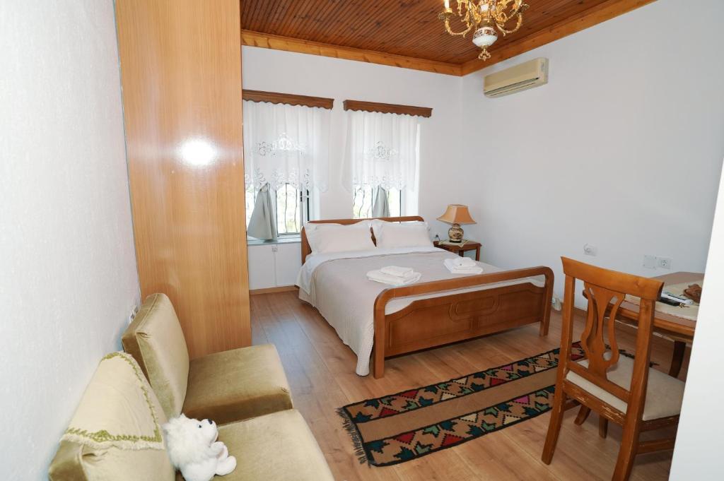 Postel nebo postele na pokoji v ubytování Amalia's House