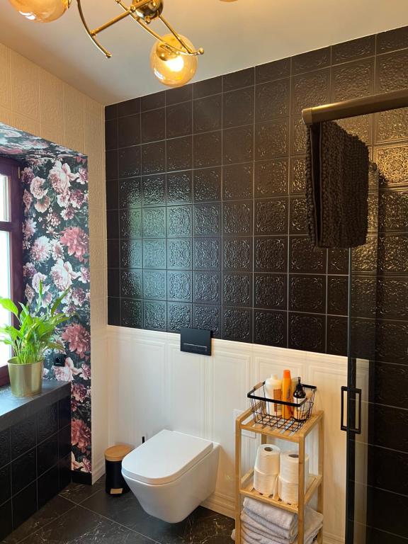 Koupelna v ubytování Apartamenty Katedralna Legnica