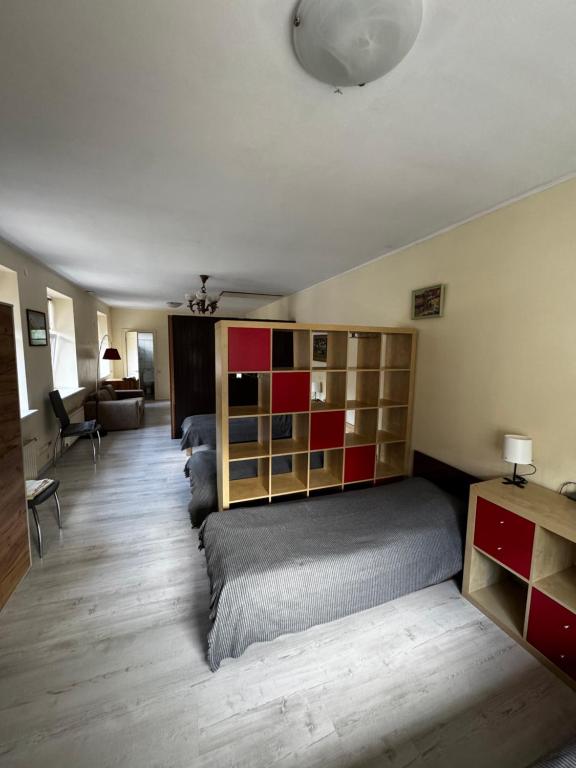 Postel nebo postele na pokoji v ubytování Vecpilsētas hostelis