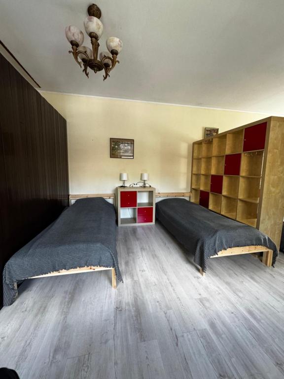 Postel nebo postele na pokoji v ubytování Vecpilsētas hostelis
