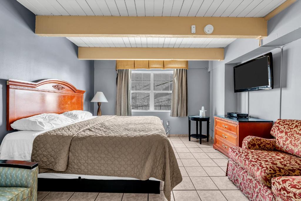 Postel nebo postele na pokoji v ubytování Aztec Ocean Resort