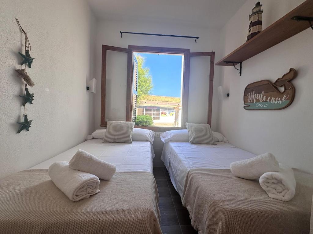 En eller flere senge i et værelse på Apartment 5 minutes from the beach!