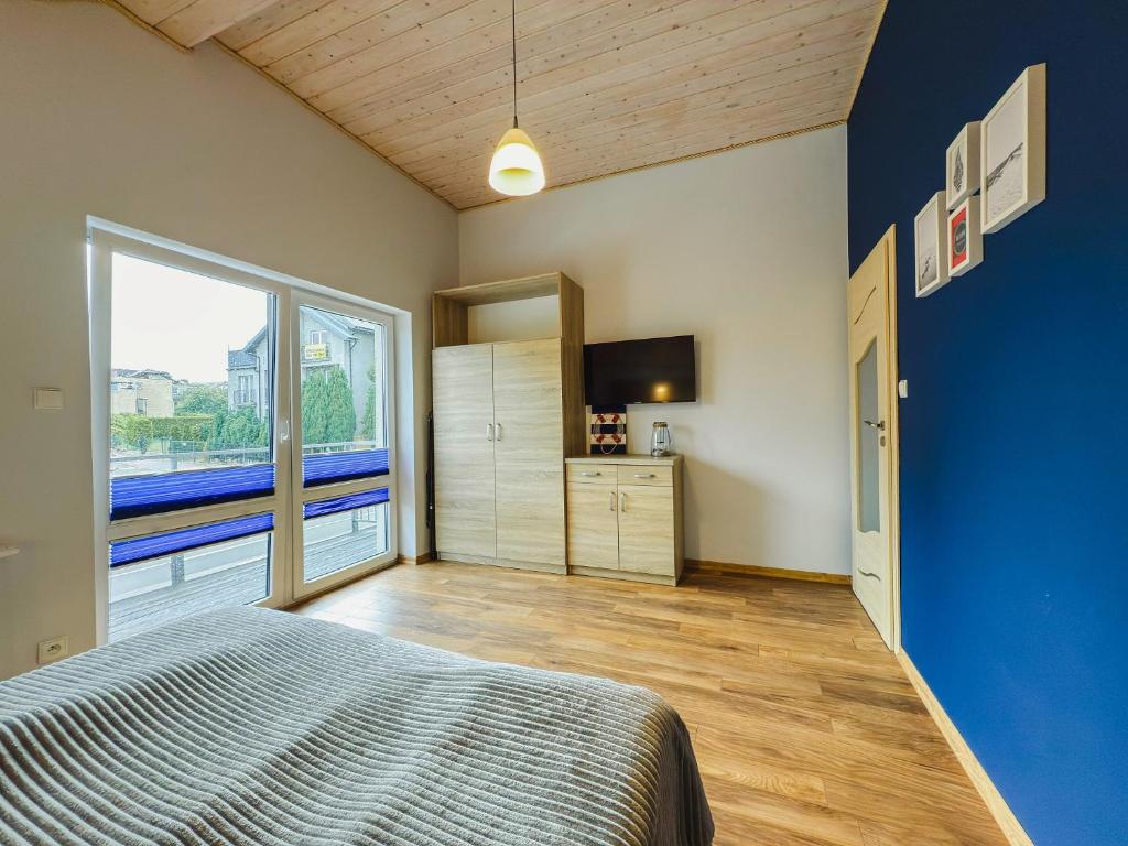 Kuchyňa alebo kuchynka v ubytovaní Rellim Apartamenty