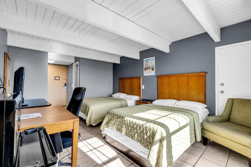 Postel nebo postele na pokoji v ubytování Aztec Ocean Resort