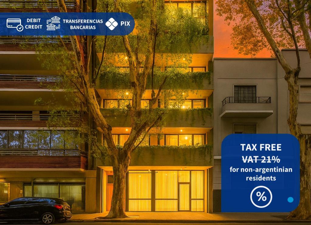 布宜诺斯艾利斯Deluxe Apartments in Palermo - by BueRentals的停在大楼前的带有标志的汽车