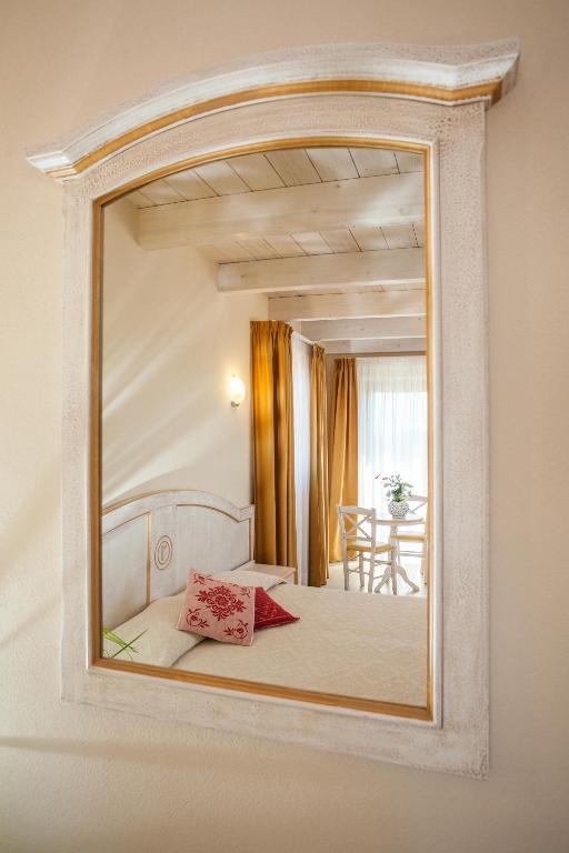 Łóżko lub łóżka w pokoju w obiekcie Hotel Raffael PHG