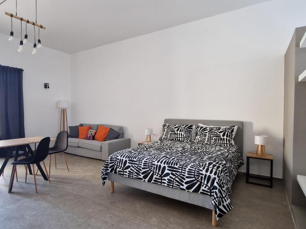 Katil atau katil-katil dalam bilik di Gis B&B ad una sola camera con piscina ad uso esclusivo