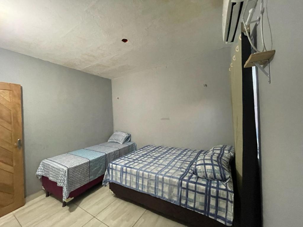 Postel nebo postele na pokoji v ubytování Hostel do Porto