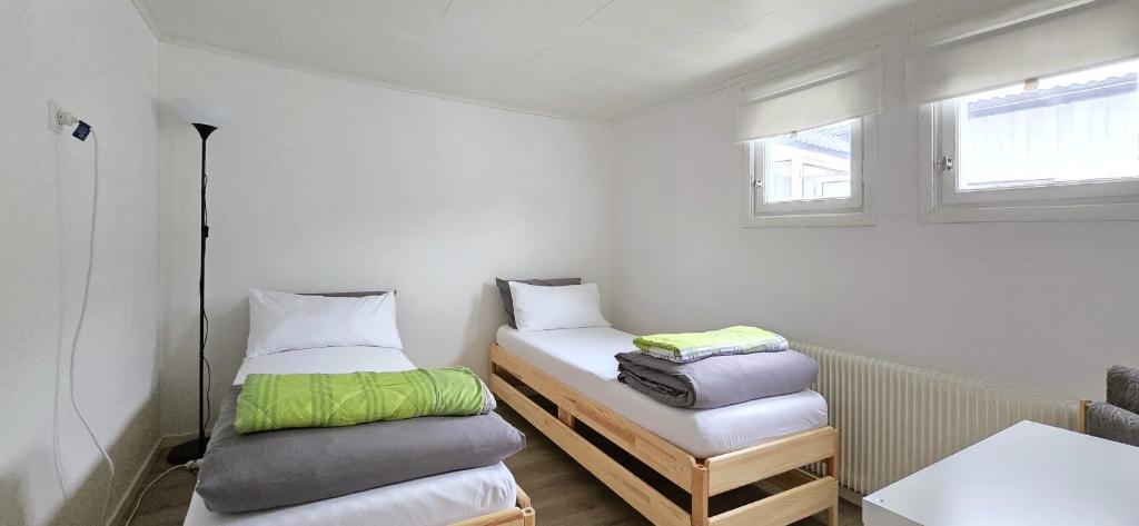 Postel nebo postele na pokoji v ubytování Hus Klarälven