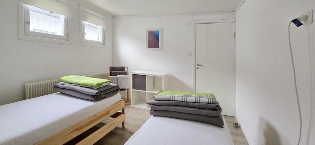 Postel nebo postele na pokoji v ubytování Hus Klarälven