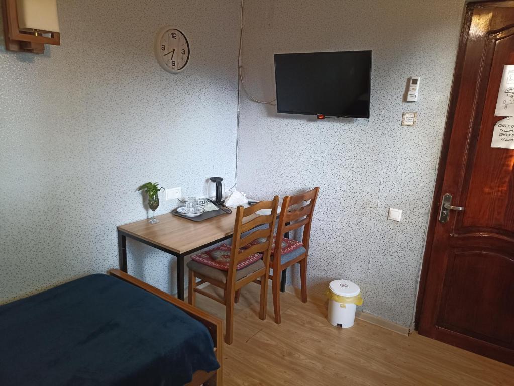 TV a/nebo společenská místnost v ubytování Rose House