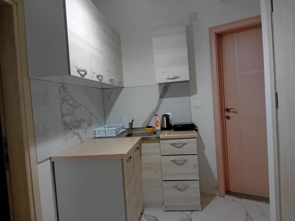 Kuchyň nebo kuchyňský kout v ubytování Urban Square