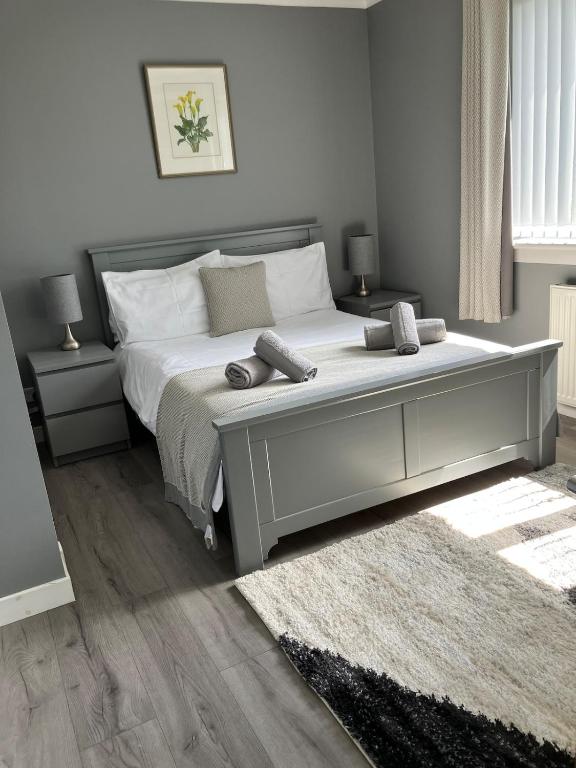 Ένα ή περισσότερα κρεβάτια σε δωμάτιο στο Esna