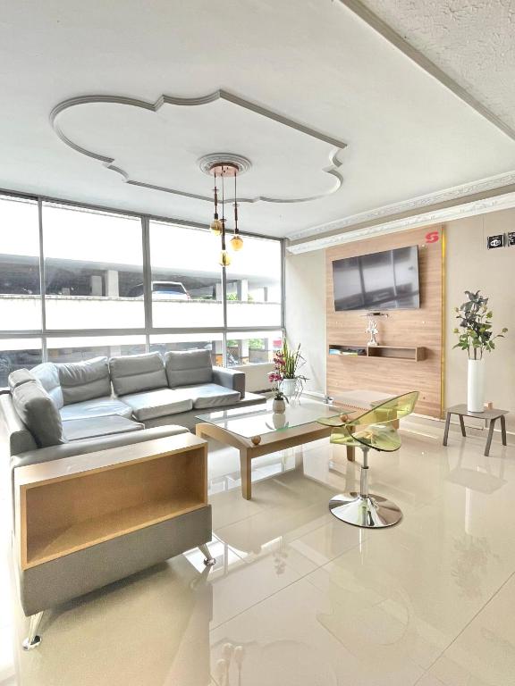 Posezení v ubytování Hotel Suite Center Pereira