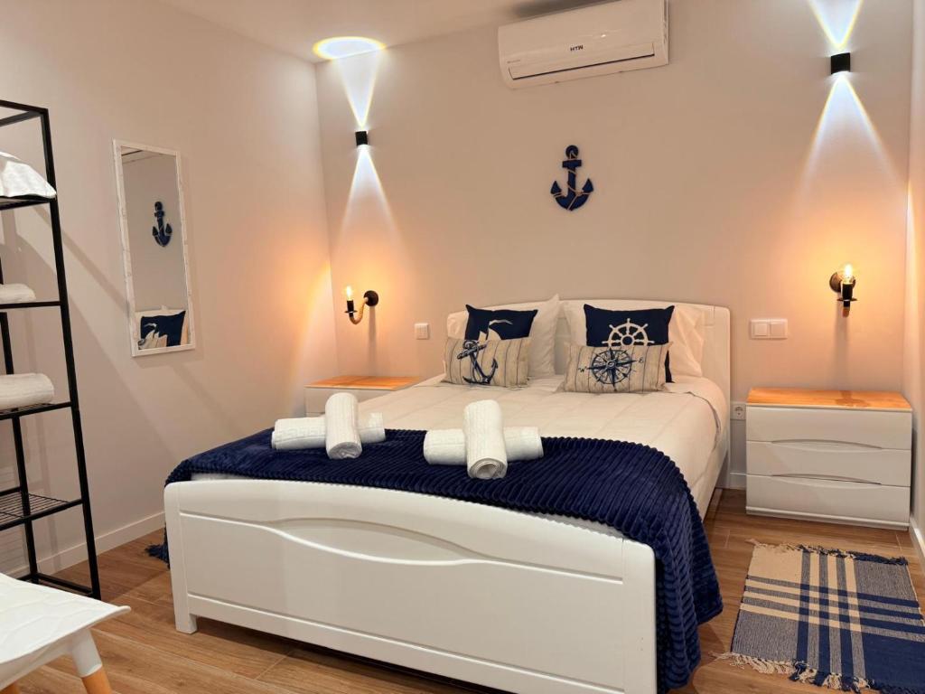 Postel nebo postele na pokoji v ubytování O Marinheiro 15A